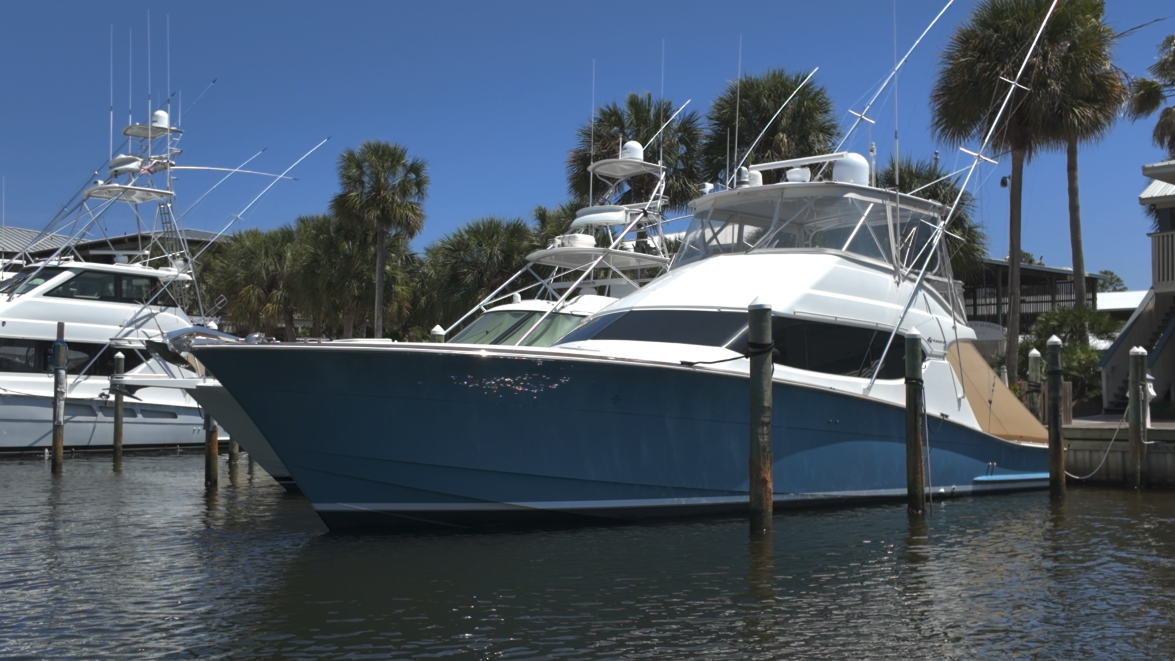 Orange Beach Marina on Marina Road with yachts and fishing boats